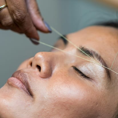 Eyebrow threading